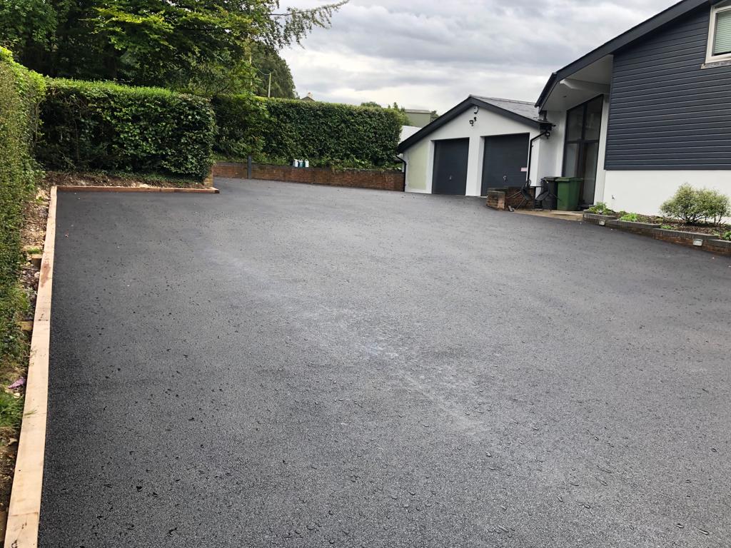 This is a photo of a asphalt driveway which is in the process of being installed by Lara Road Tech