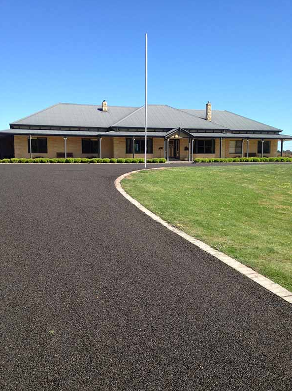 This is a photo of an asphalt driveway which has been installed by Lara Road Tech